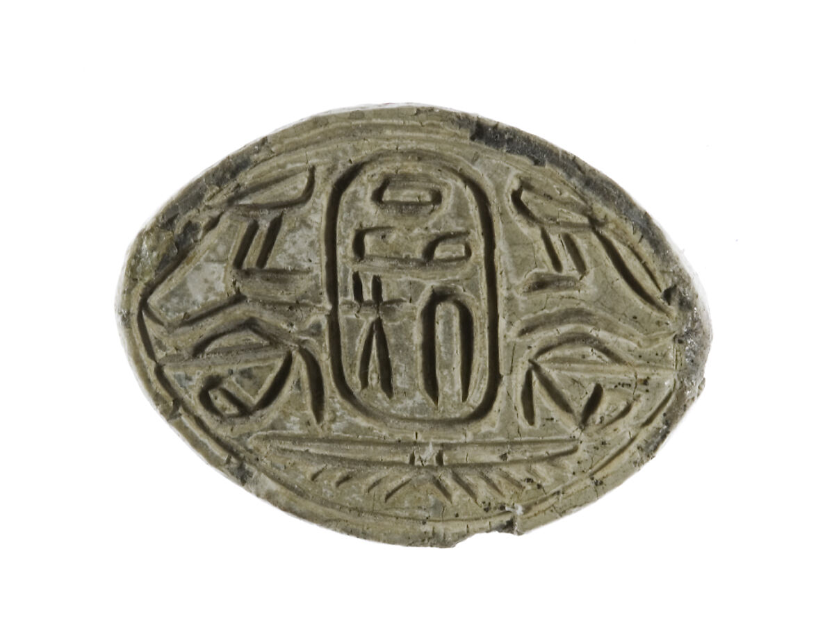 Cowroid Seal Amulet with the Name of the Hyksos King Apophis, Steatite, white glaze 