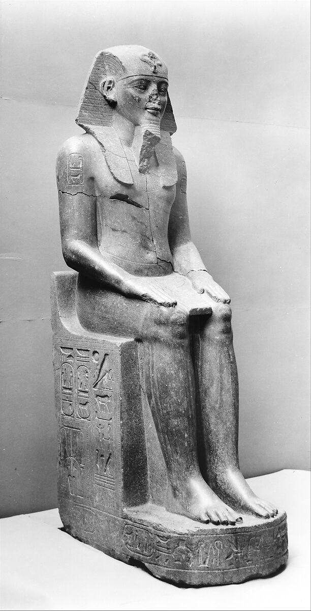 Colossal Statue of  Amenhotep III, reworked, reinscribed by Merneptah, Porphyritic diorite 