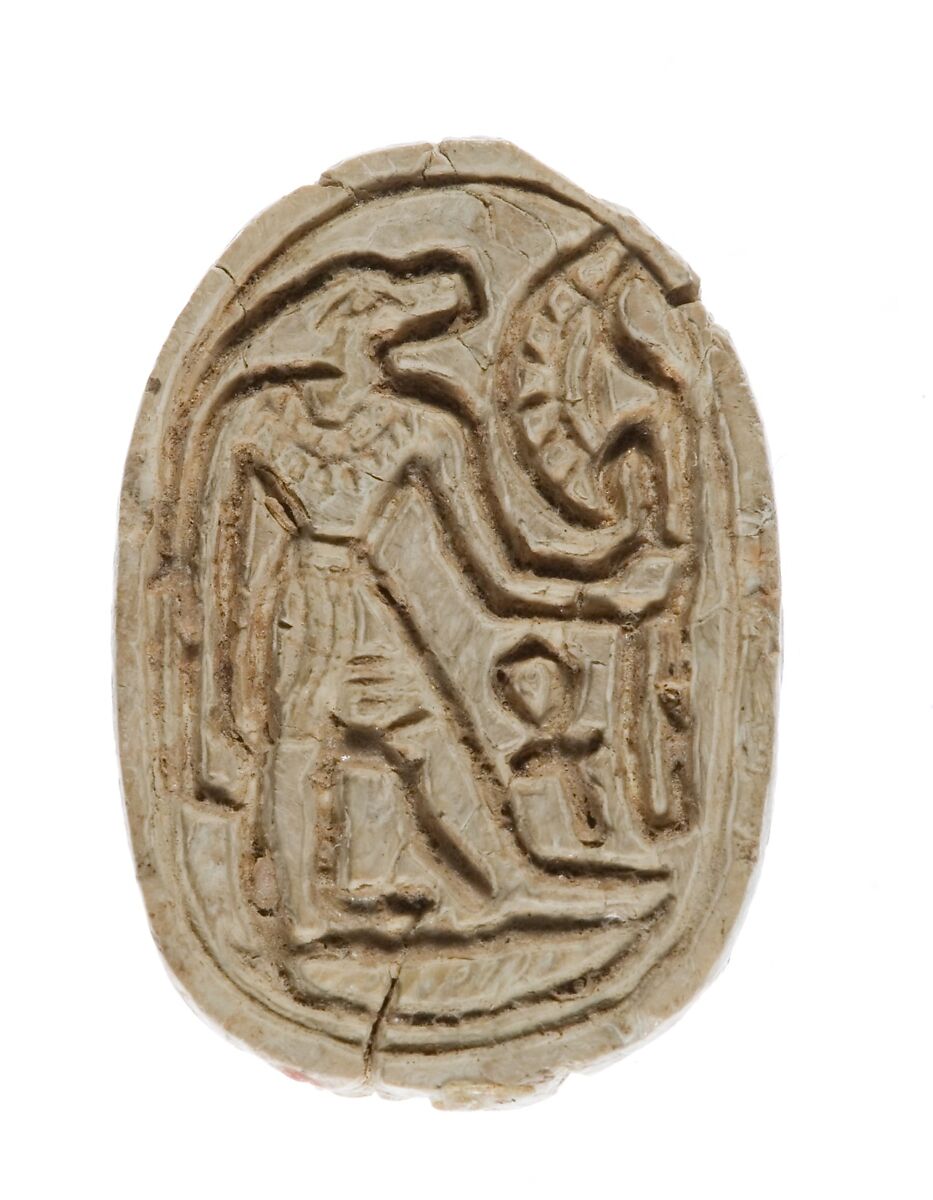 Scarab with a Crocodile Headed Figure Holding a Flower, Glazed steatite 