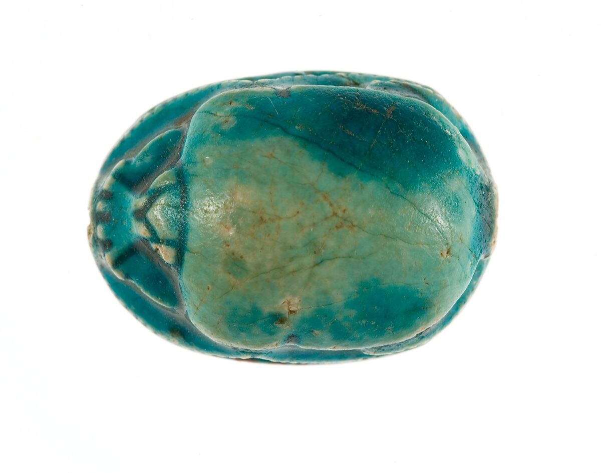 Scarab with a Solar/Lunar Deity (?) Protected by Two Animal Headed Figures, Steatite (glazed)