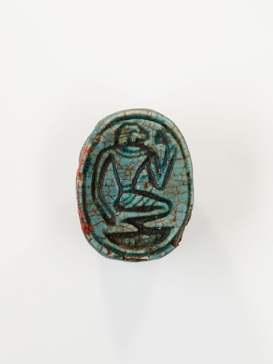 Scarab depicting a kneeling man (?), Steatite (glazed) 