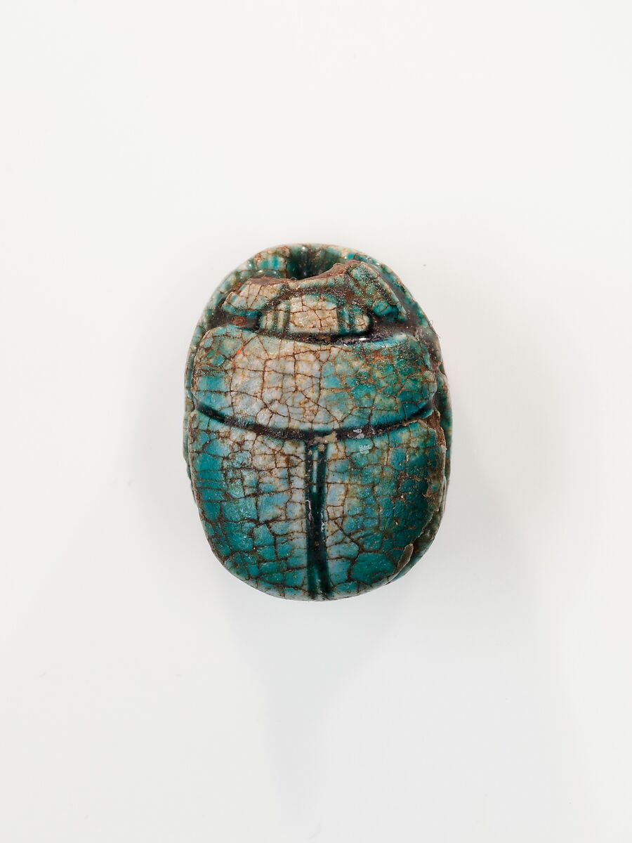 Scarab depicting a kneeling man (?), Steatite (glazed)