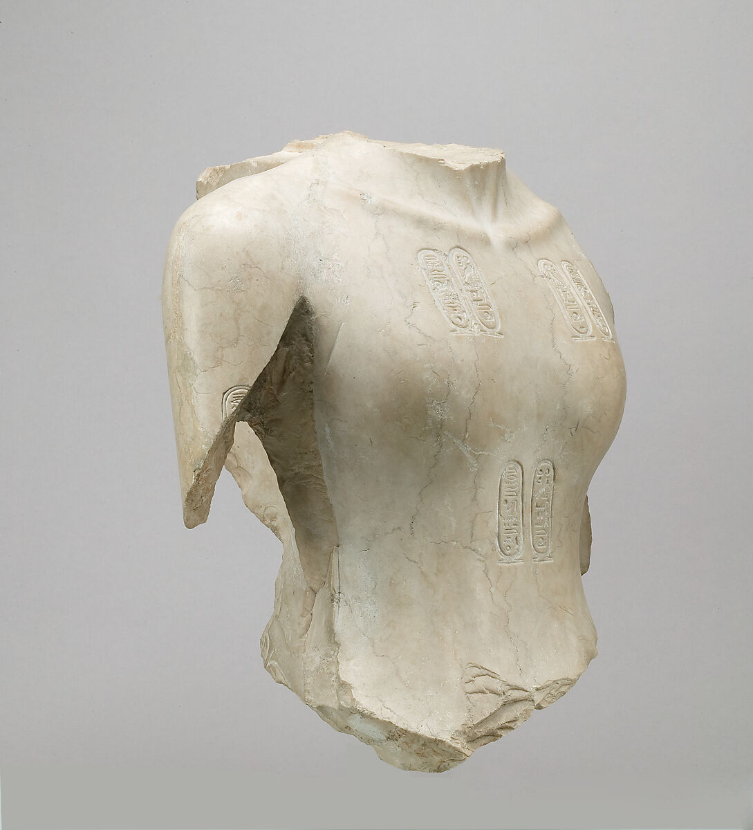Torso of Akhenaten, Indurated limestone