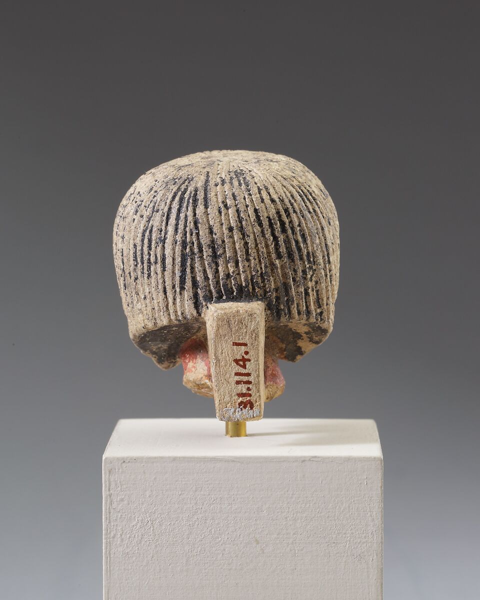 Head from a statuette, Limestone, paint
