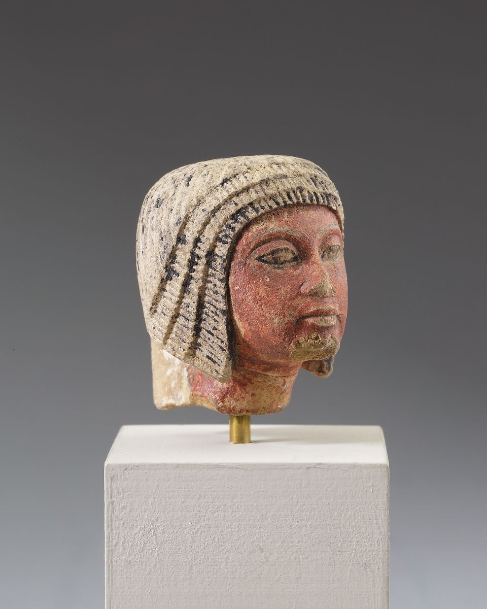 Head from a statuette, Limestone, paint