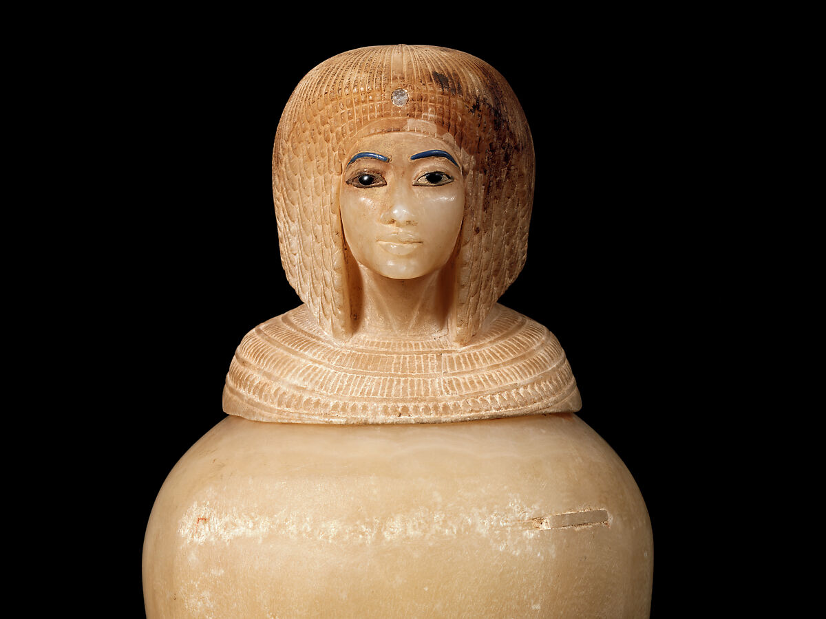 Canopic Jar (07.226.1) with a Lid Depicting a Queen (30.8.54), Travertine (Egyptian alabaster), blue glass, obsidian, unidentified stone