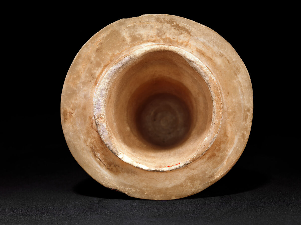 Canopic Jar (07.226.1) with a Lid Depicting a Queen (30.8.54), Travertine (Egyptian alabaster), blue glass, obsidian, unidentified stone