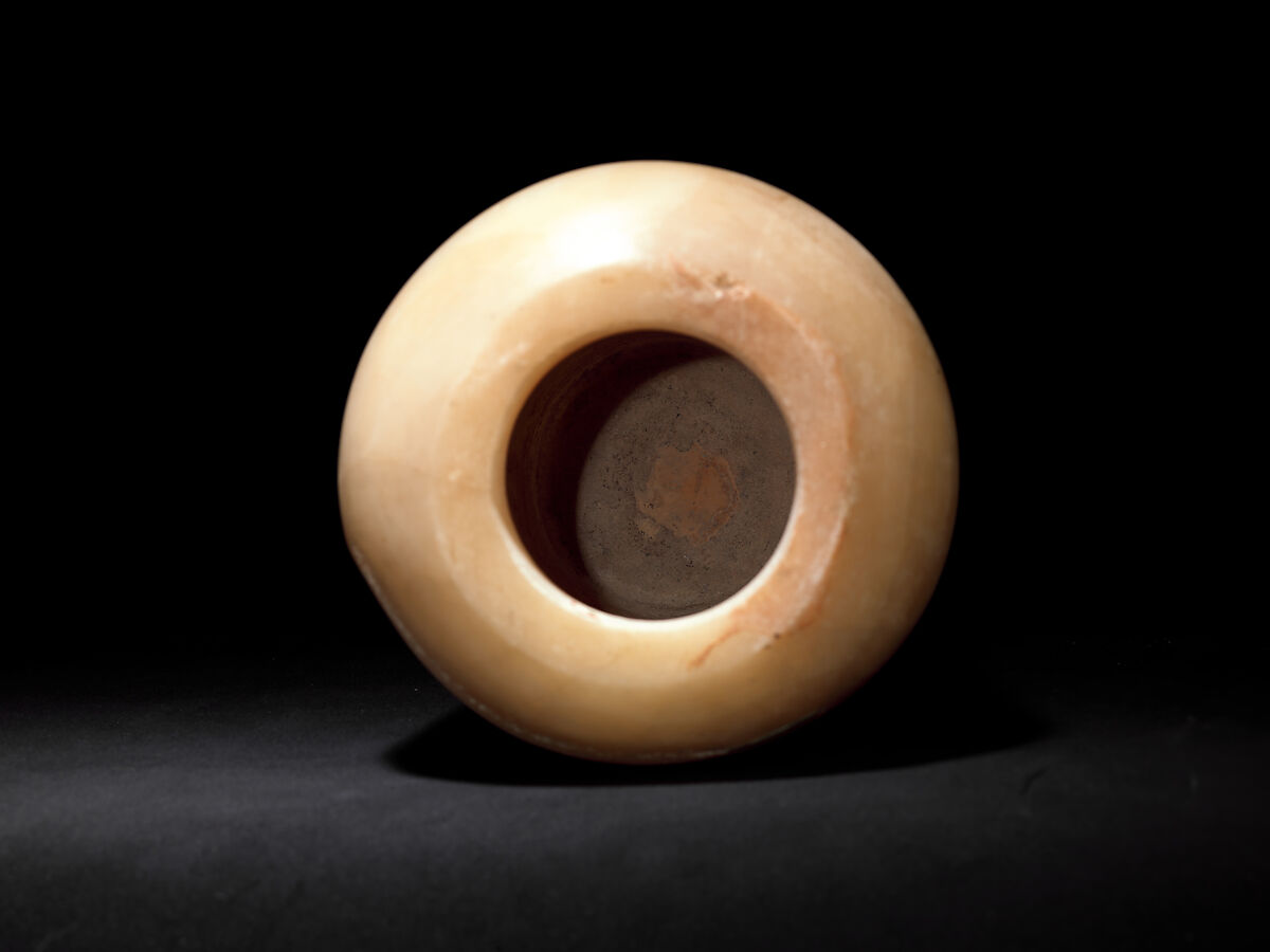 Canopic Jar (07.226.1) with a Lid Depicting a Queen (30.8.54), Travertine (Egyptian alabaster), blue glass, obsidian, unidentified stone