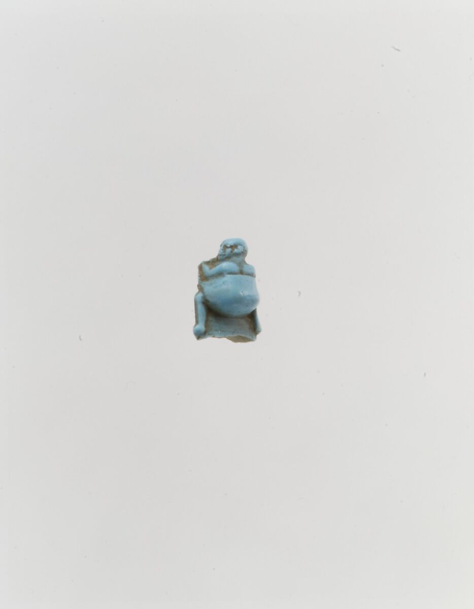 Small Child in a Sling, Glassy faience 