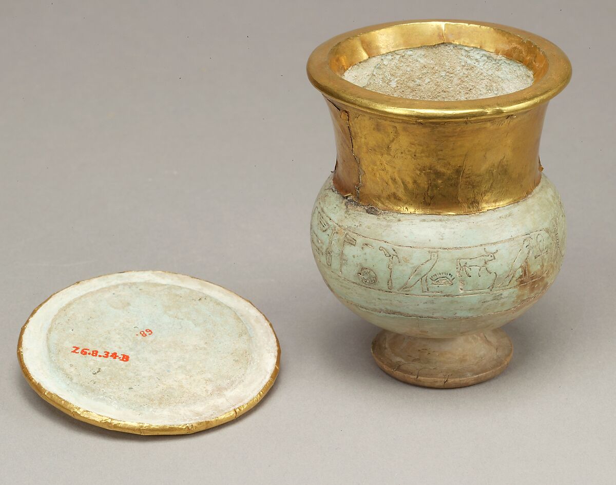 Wide-necked jar and lid naming Thutmose III, Vitreous material, gold