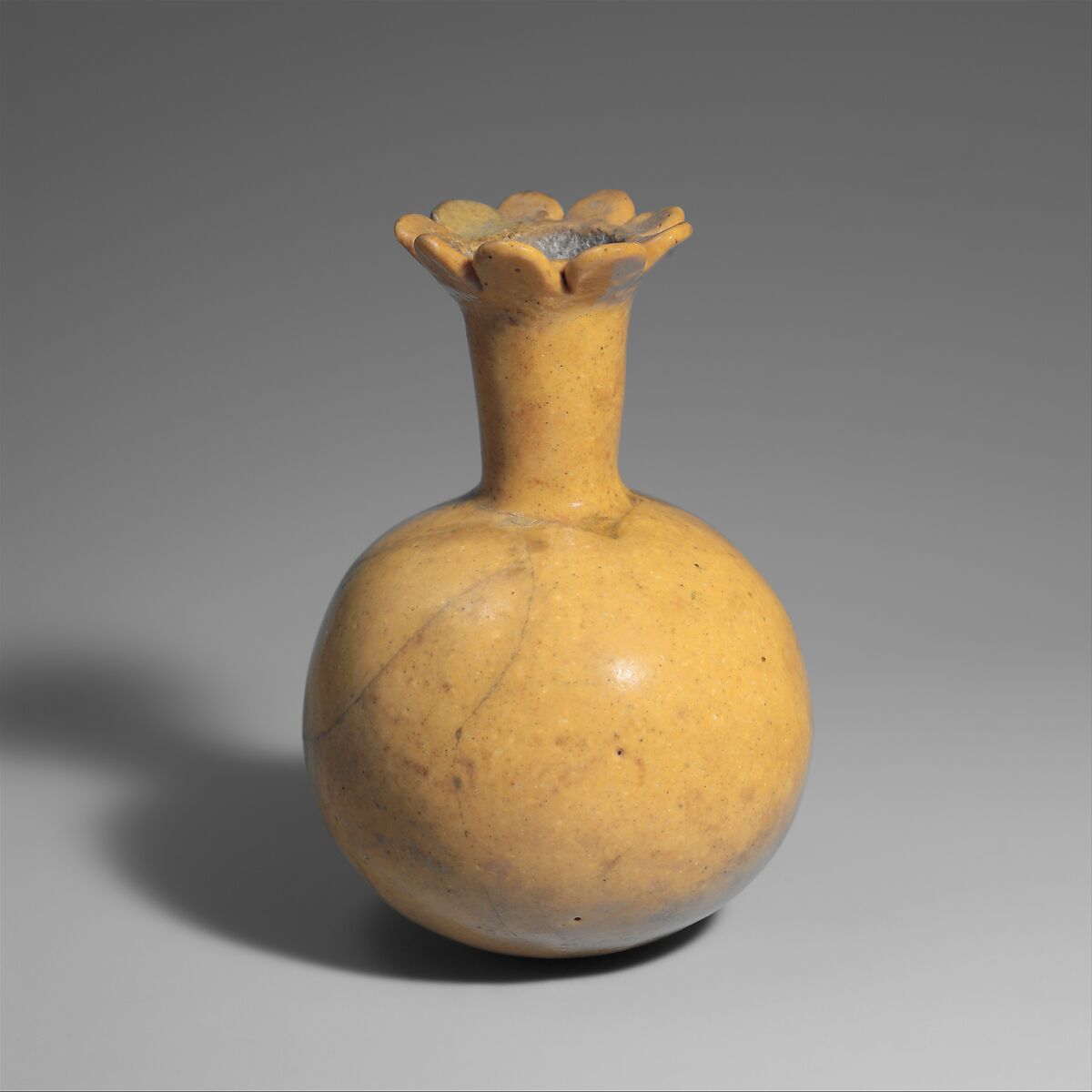 Bottle in the Form of a Pomegranate, Glass, opaque
