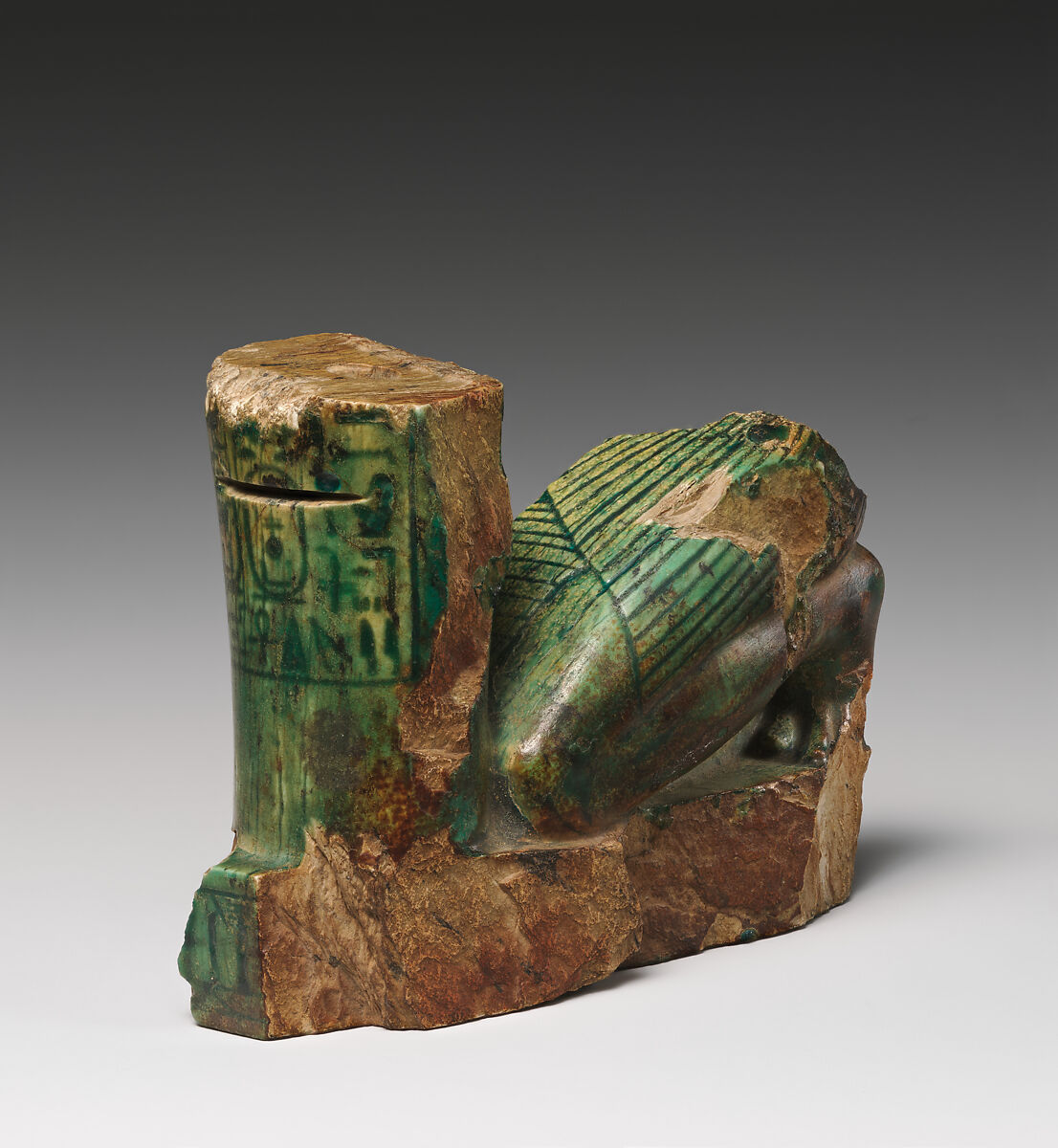 Fragmentary statuette of kneeling King Shabaqo, Glazed steatite, paint