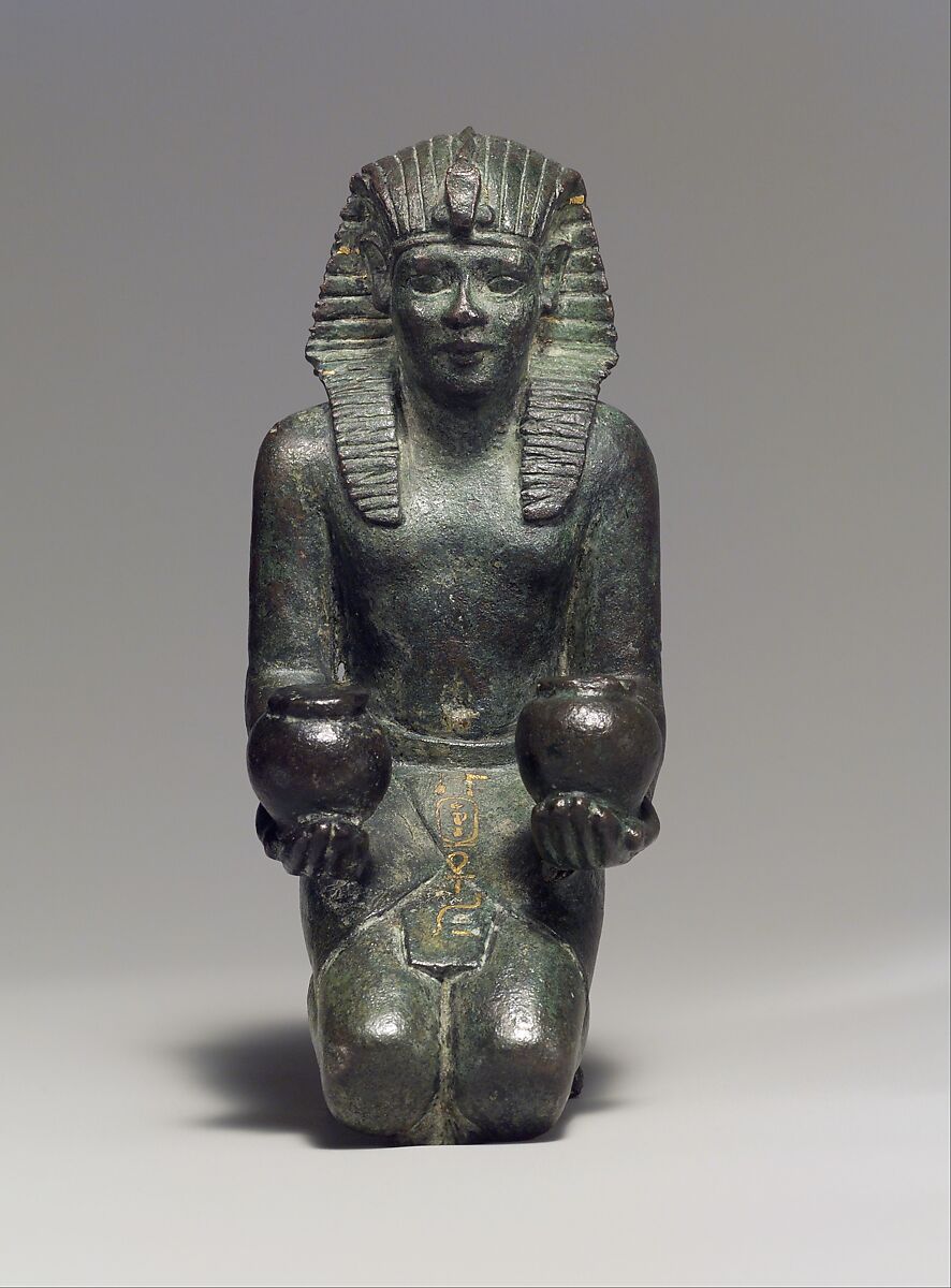 Kneeling statuette of King Amasis, Bronze, precious metal inlay and leaf 