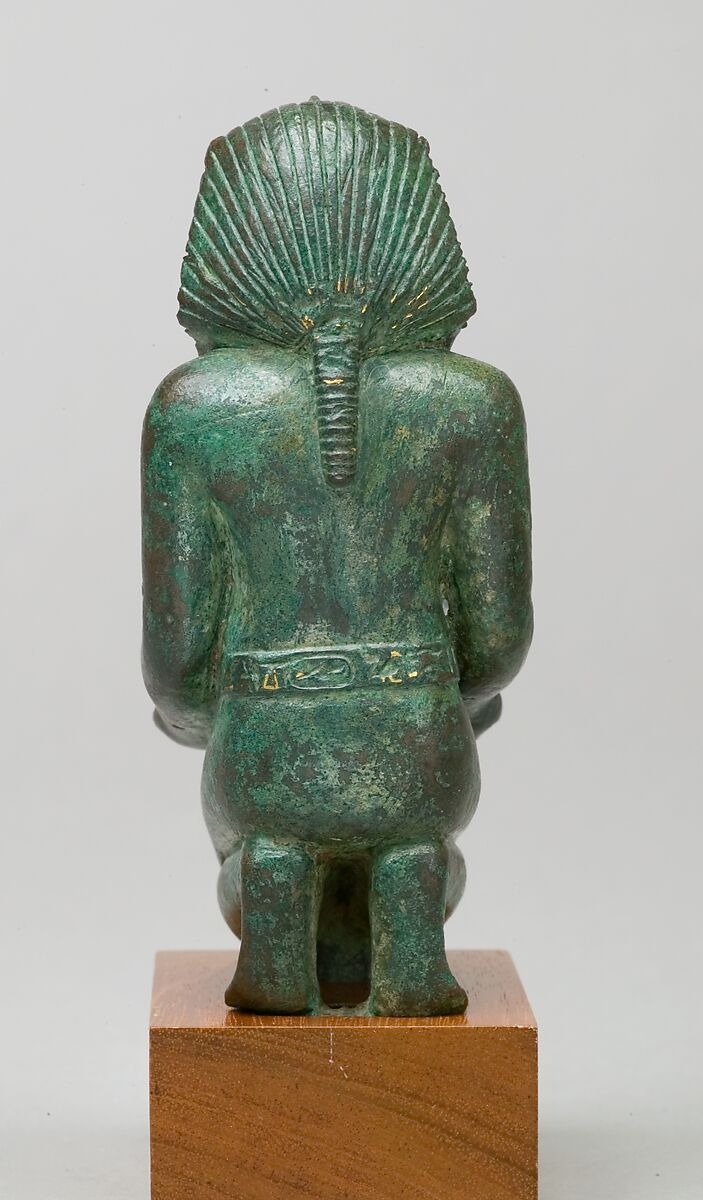 Kneeling statuette of King Amasis, Bronze, precious metal inlay and leaf