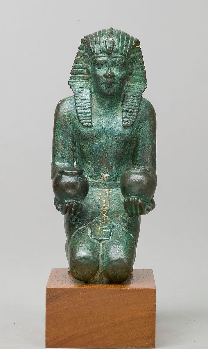 Kneeling statuette of King Amasis, Bronze, precious metal inlay and leaf