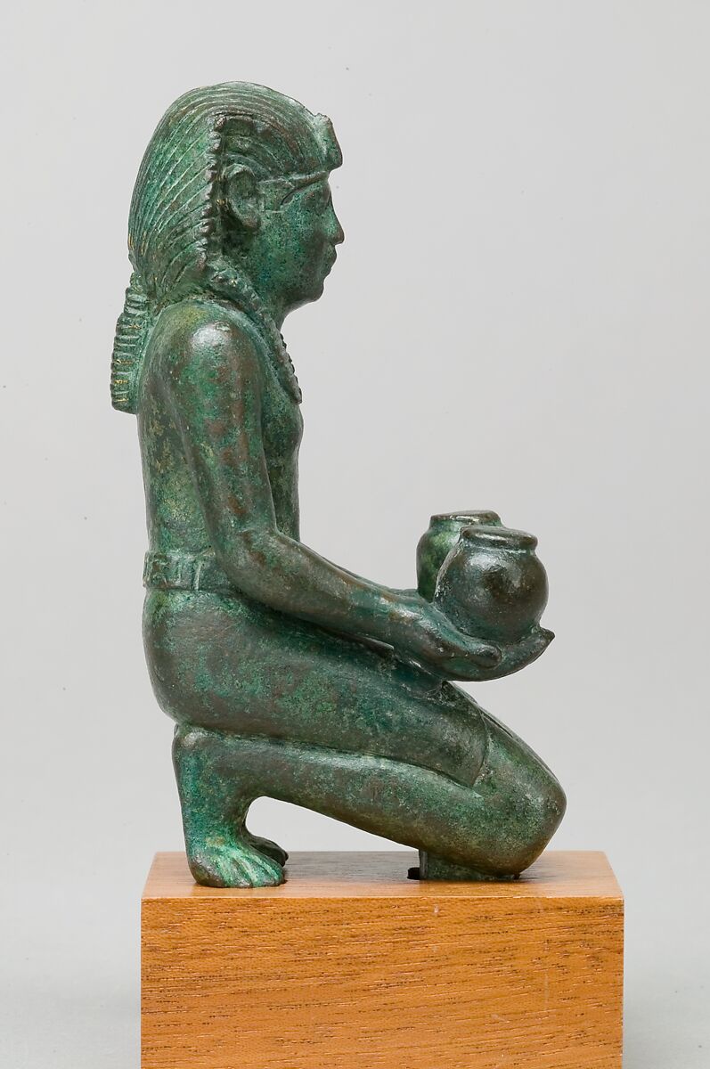 Kneeling statuette of King Amasis, Bronze, precious metal inlay and leaf