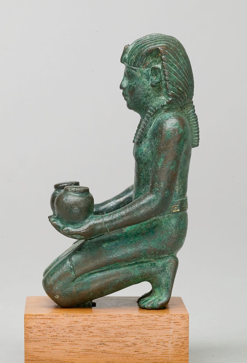 Kneeling statuette of King Amasis, Bronze, precious metal inlay and leaf
