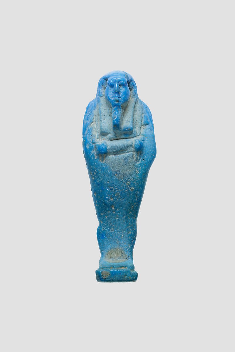 Uninscribed shabti from the tomb of Nespekashuty(?), Faience 