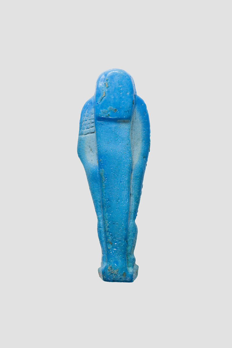 Uninscribed shabti from the tomb of Nespekashuty(?), Faience