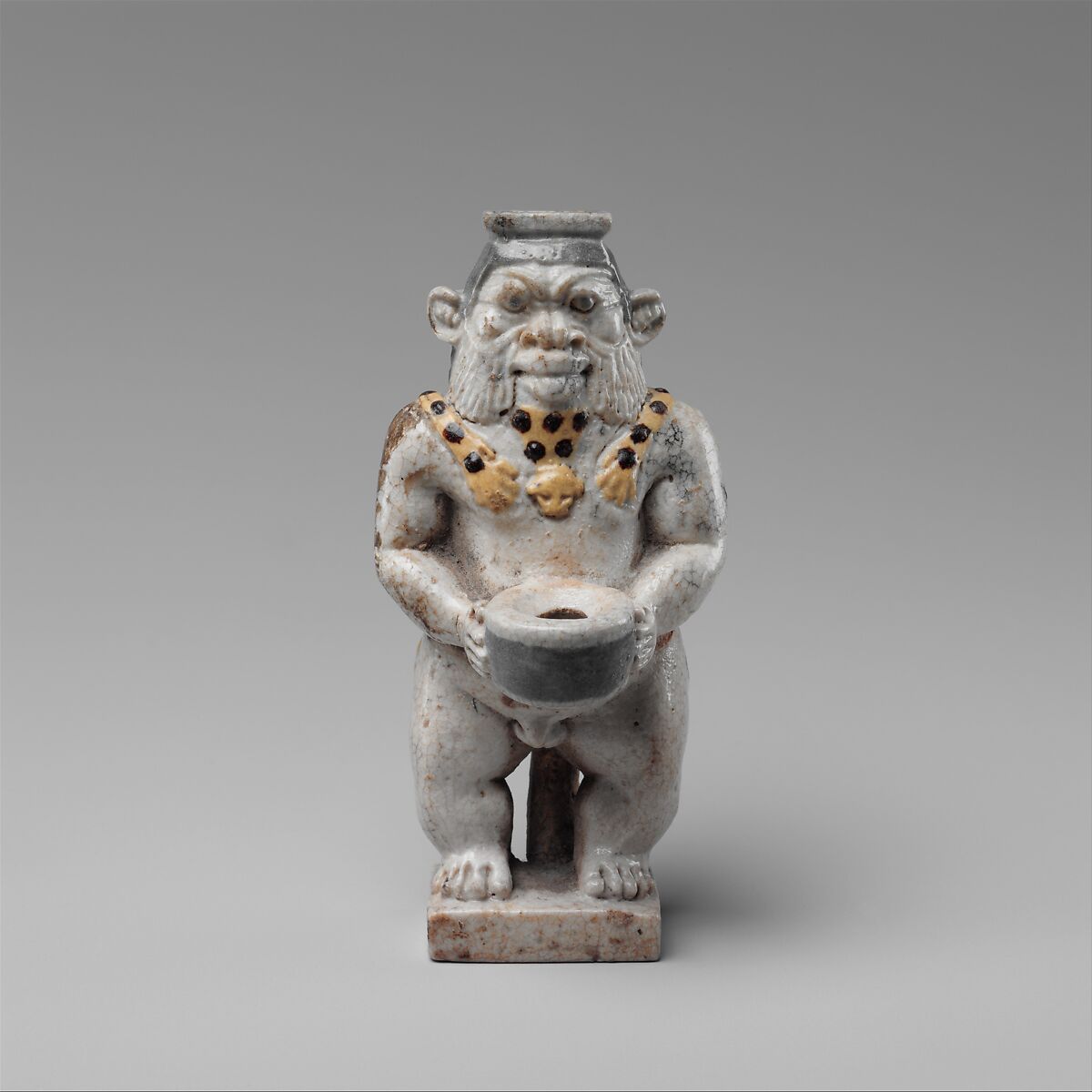 Cosmetic Container in the Form of a Bes-image, Faience