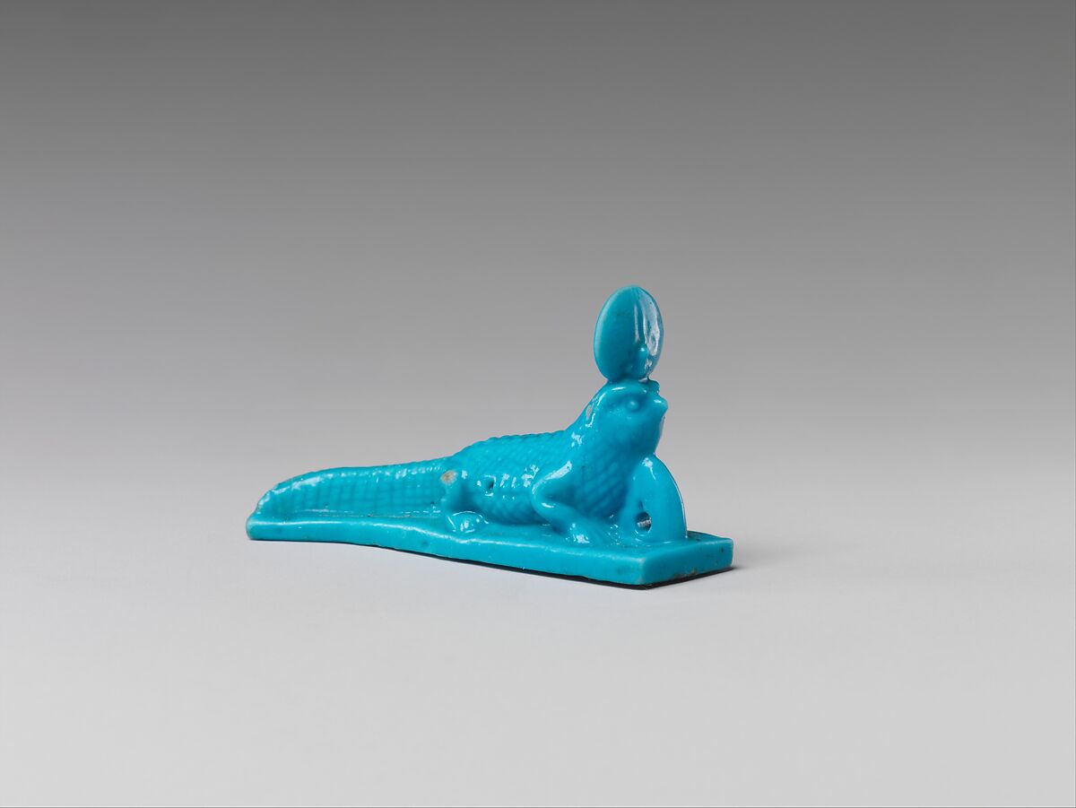 Falcon-headed crocodile amulet, Faience