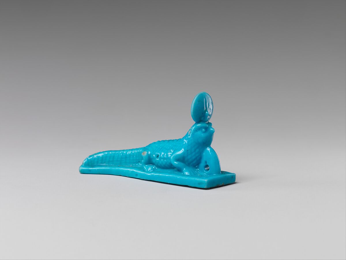 Falcon-headed crocodile amulet, Faience 