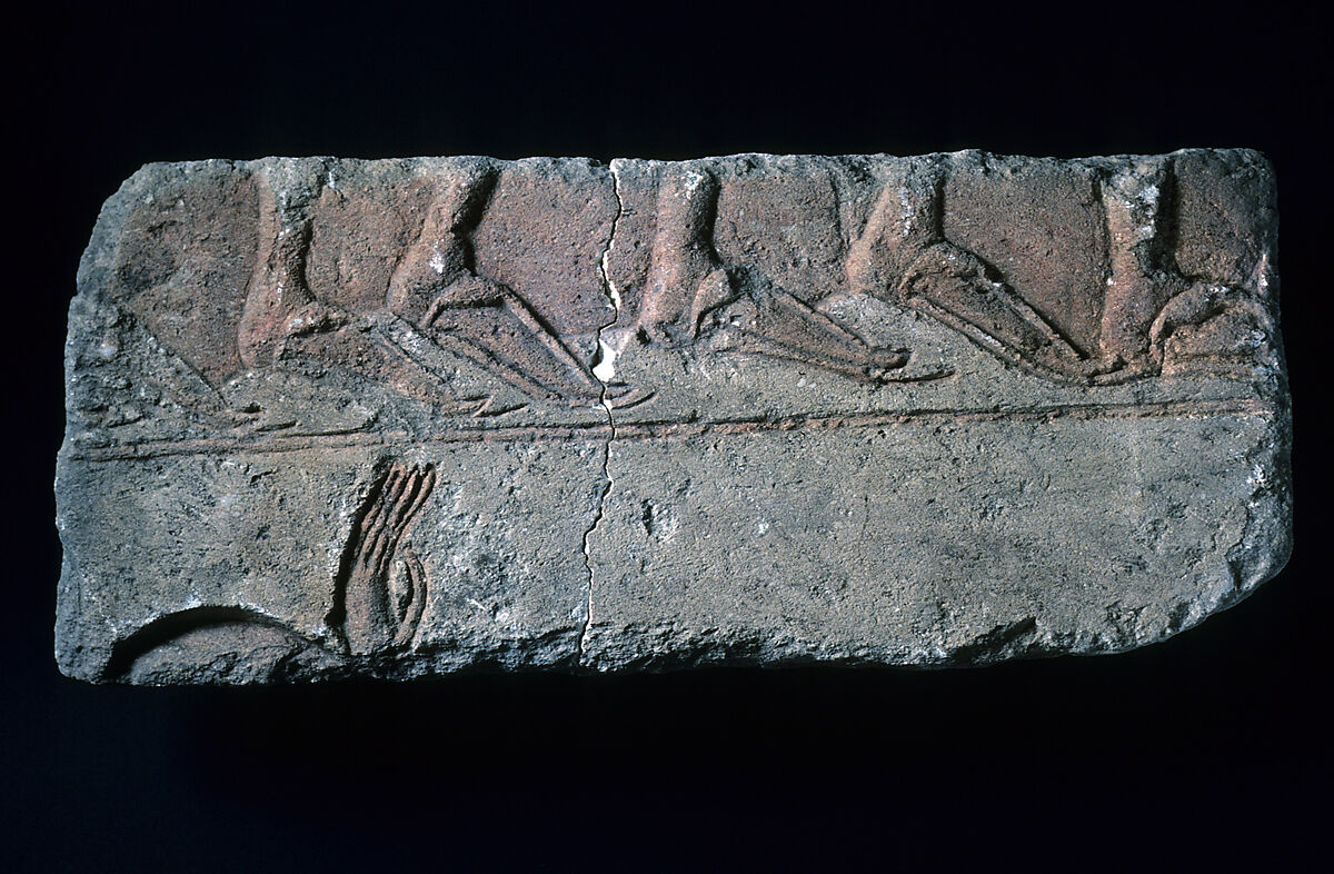 Relief fragment with sandalled feet, Limestone, paint 