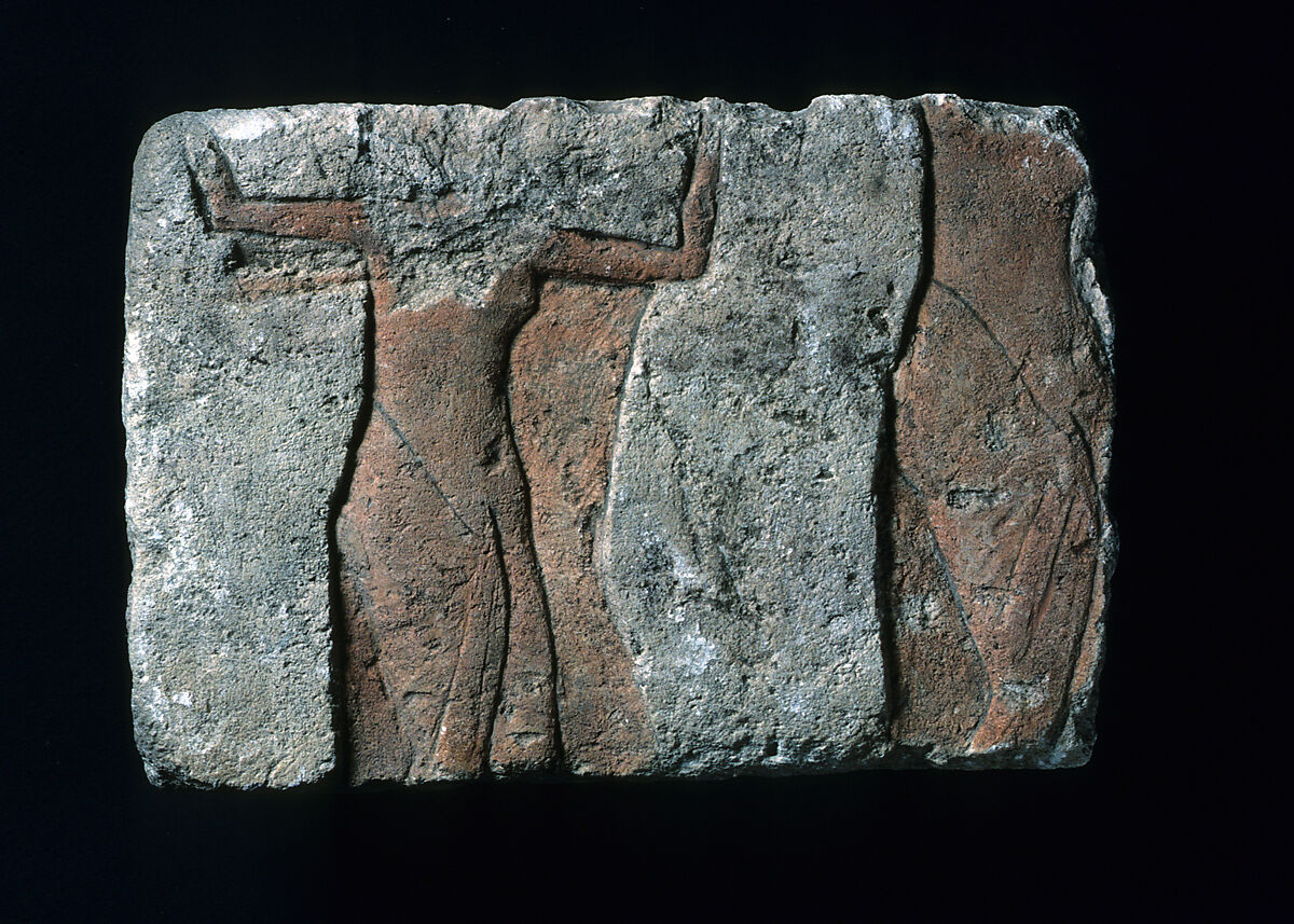 Relief fragment with a male figure, Limestone, paint (mostly modern) 