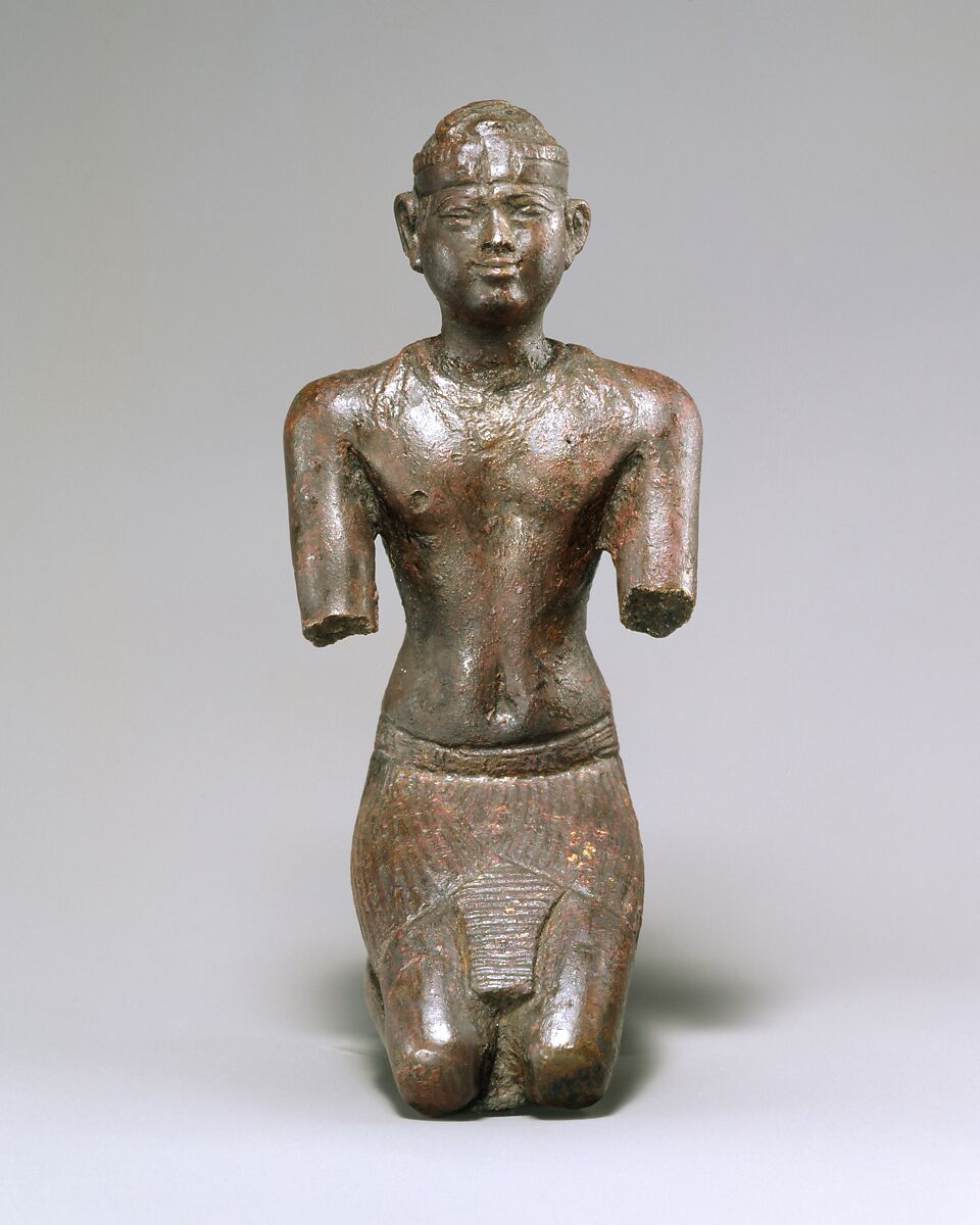 Statue of a kneeling Kushite king, Bronze; gold leaf