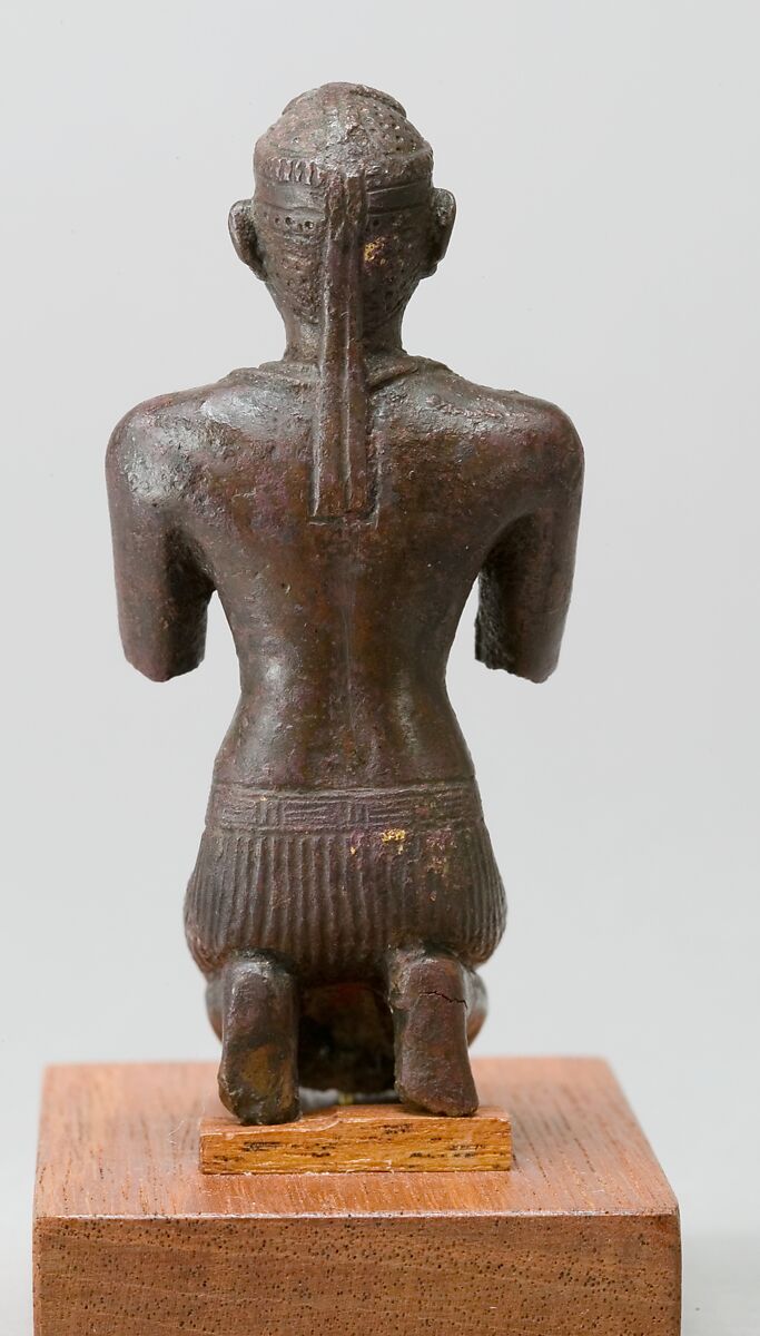Statue of a kneeling Kushite king, Bronze; gold leaf