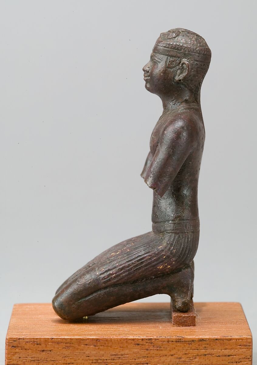 Statue of a kneeling Kushite king, Bronze; gold leaf