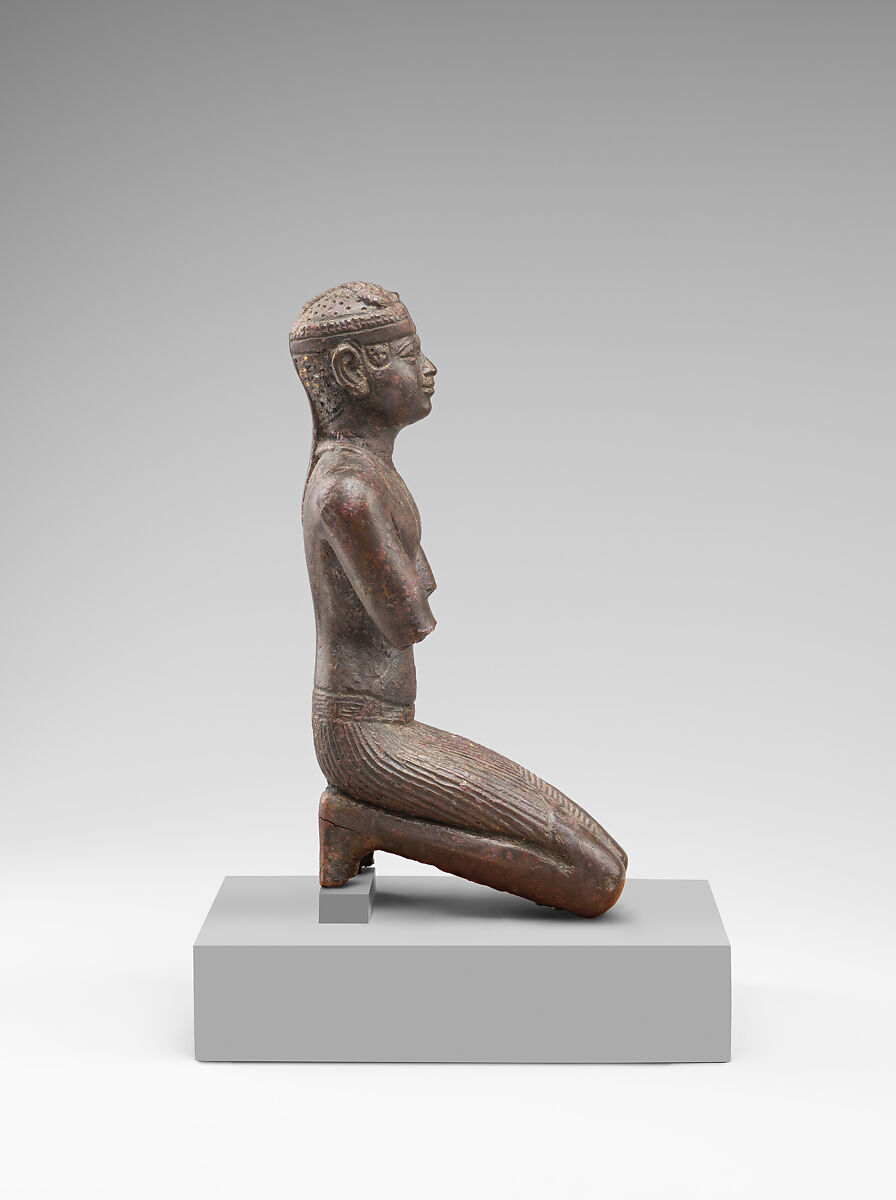 Statue of a kneeling Kushite king, Bronze; gold leaf