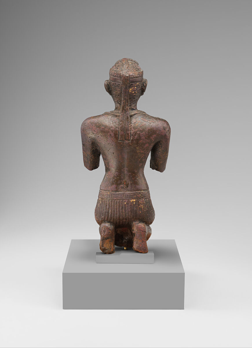 Statue of a kneeling Kushite king, Bronze; gold leaf