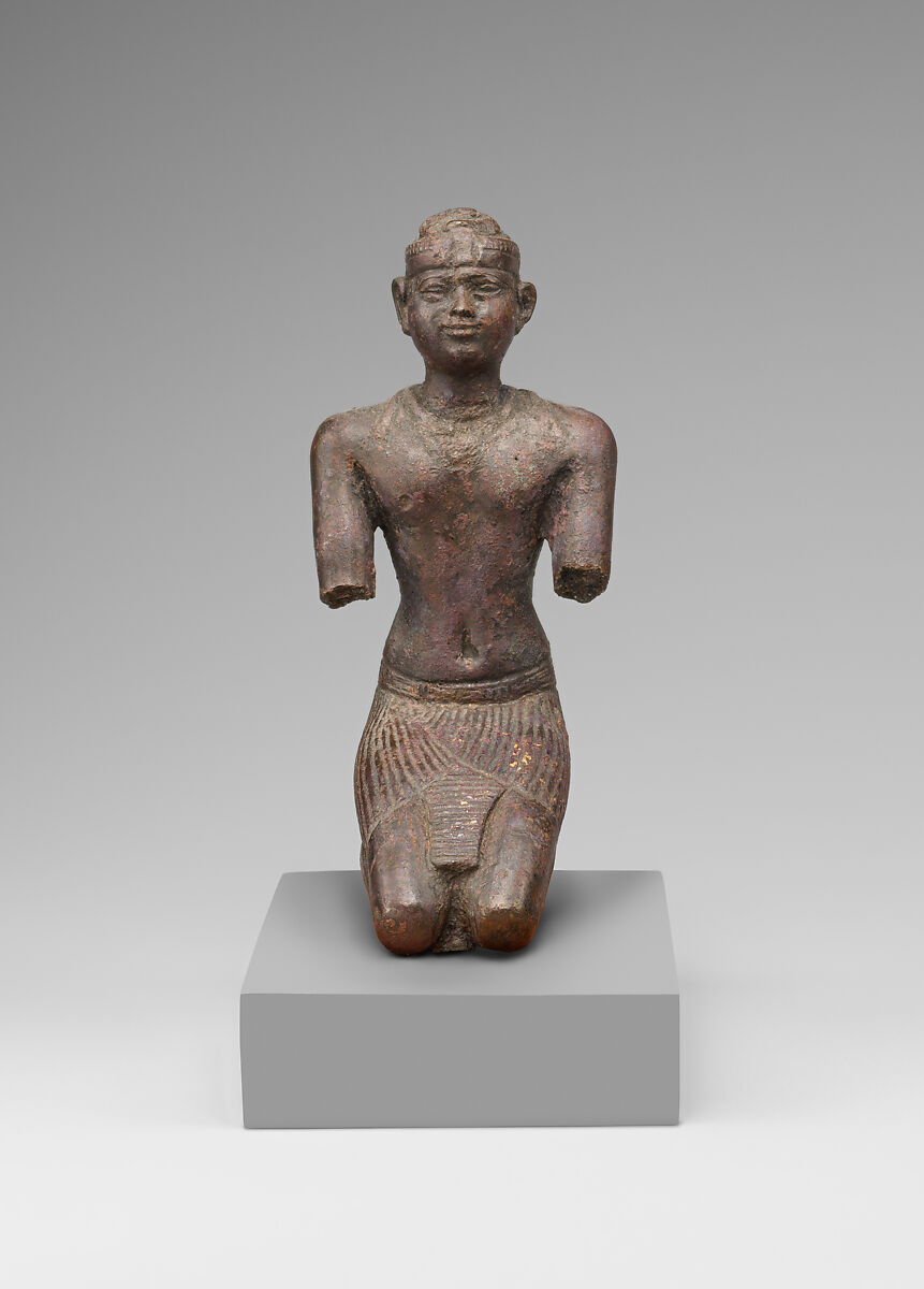 Statue of a kneeling Kushite king, Bronze; gold leaf