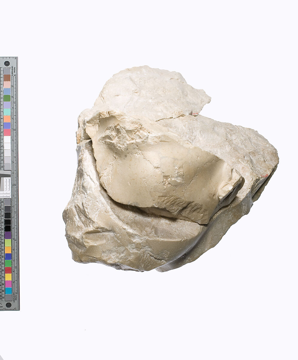 Head of Akhenaten Wearing the Blue Crown, traces of a hieroglyph behind the neck, Indurated limestone