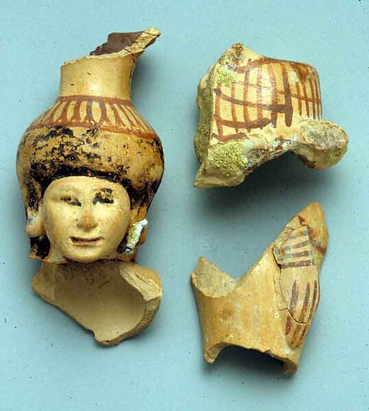 Fragments of a vase in the form of a woman holding a basket, Pottery, paint
