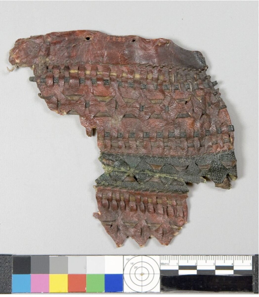 Fragment of a quiver (?), Leather (cattle hide), dye (red madder)