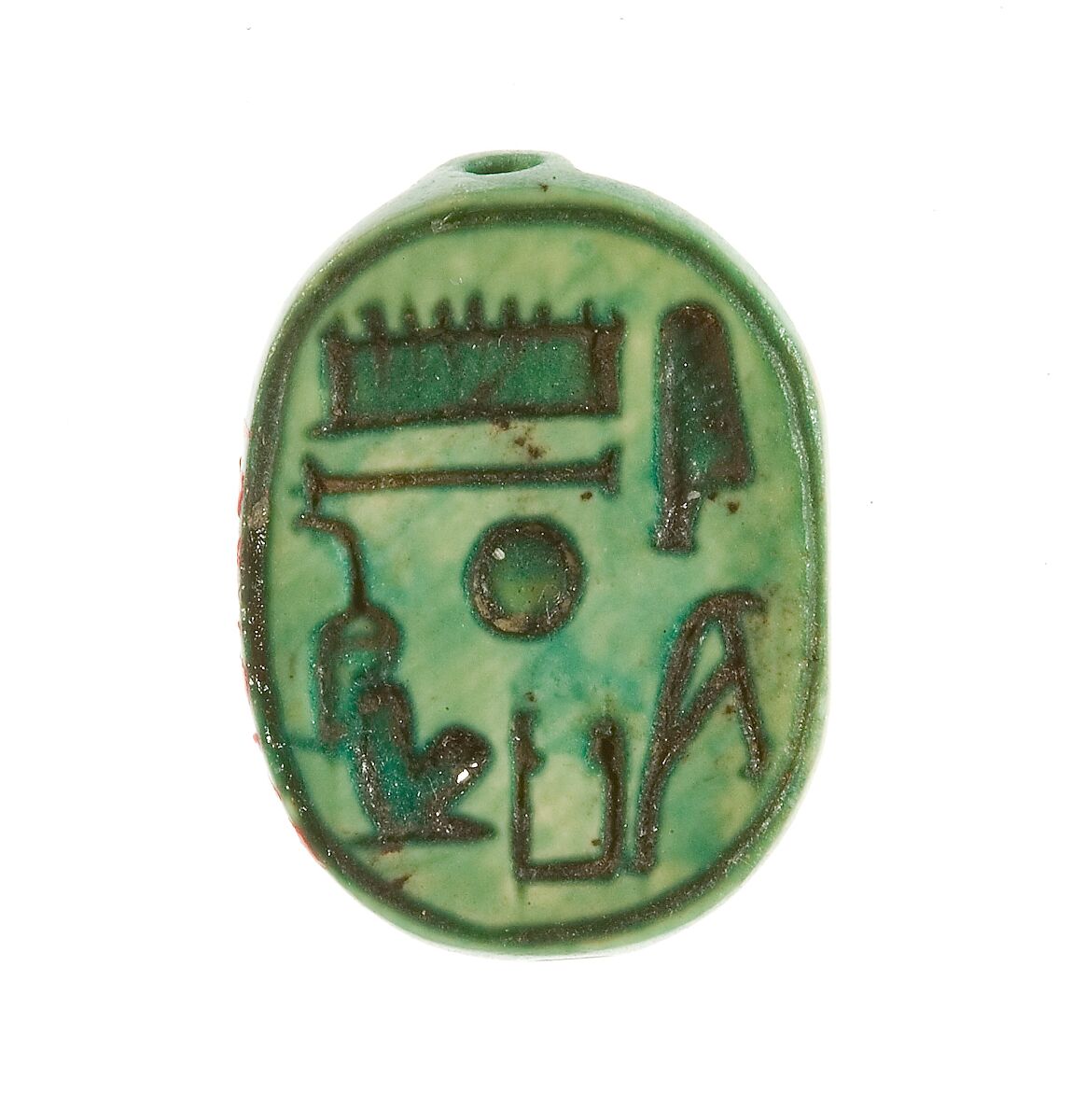 Wadjet-eye Stamp Seal inscribed "Maatkare, Beloved of Amun", Steatite (glazed) 