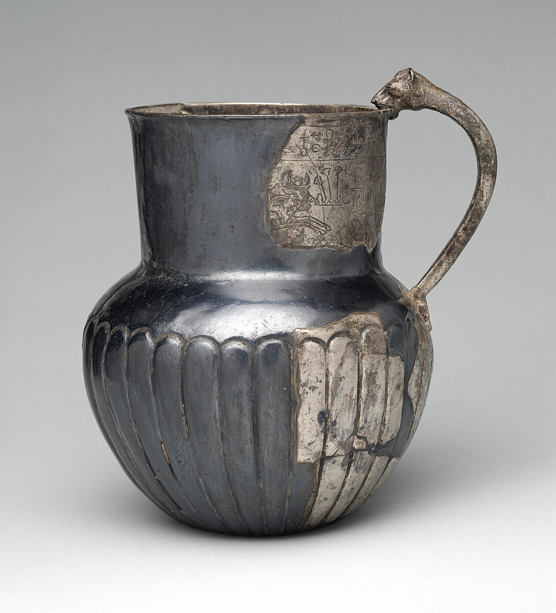 Decorated Jug with Feline-Head Handle naming Atumemtaneb, Silver