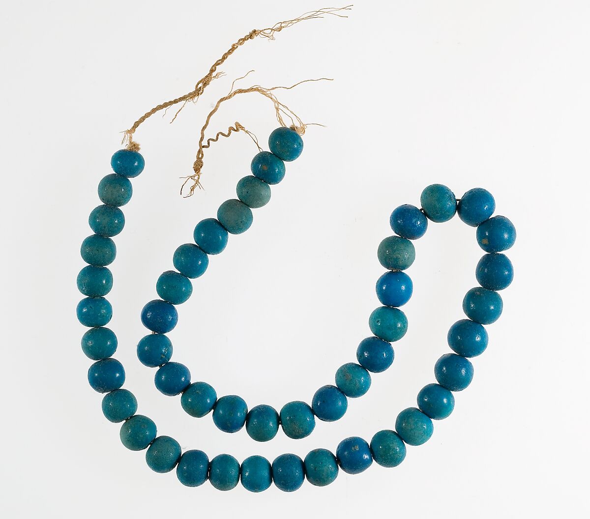 Necklace of Wah, Faience, linen cord 