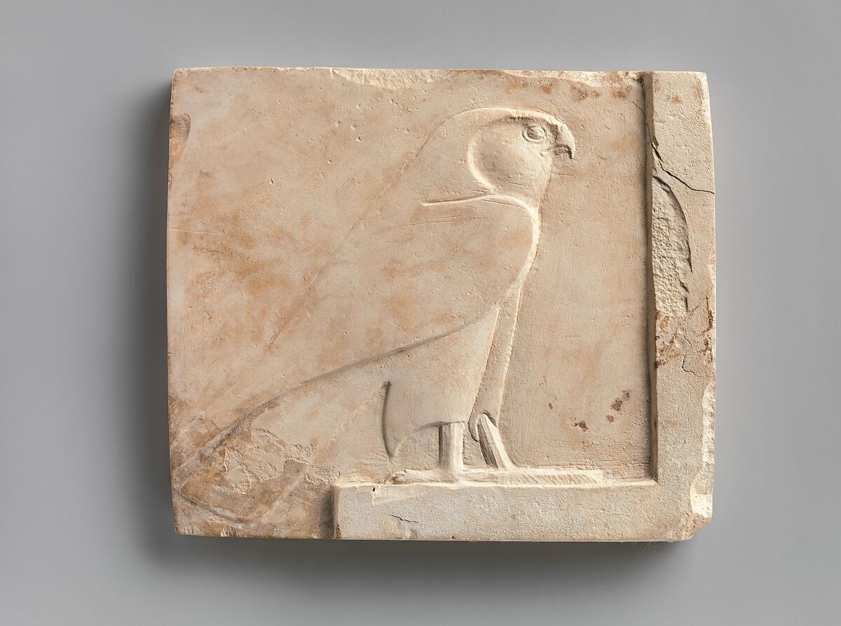 Relief  plaque with Wadjet and Nekhbet, the "Two Ladies"; falcon on opposite, Limestone