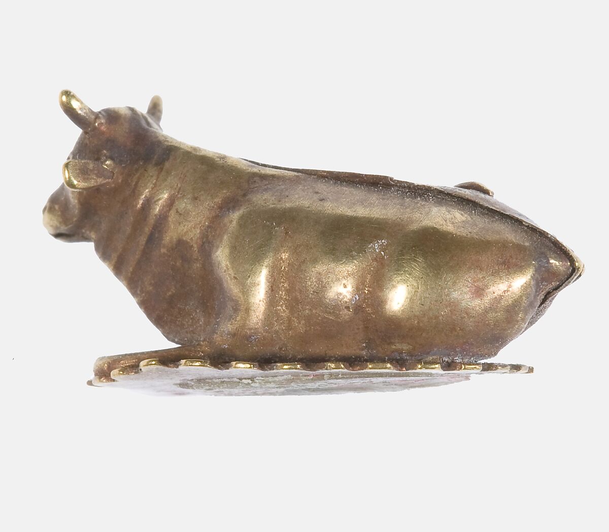 Resting bovine figurine, Gold