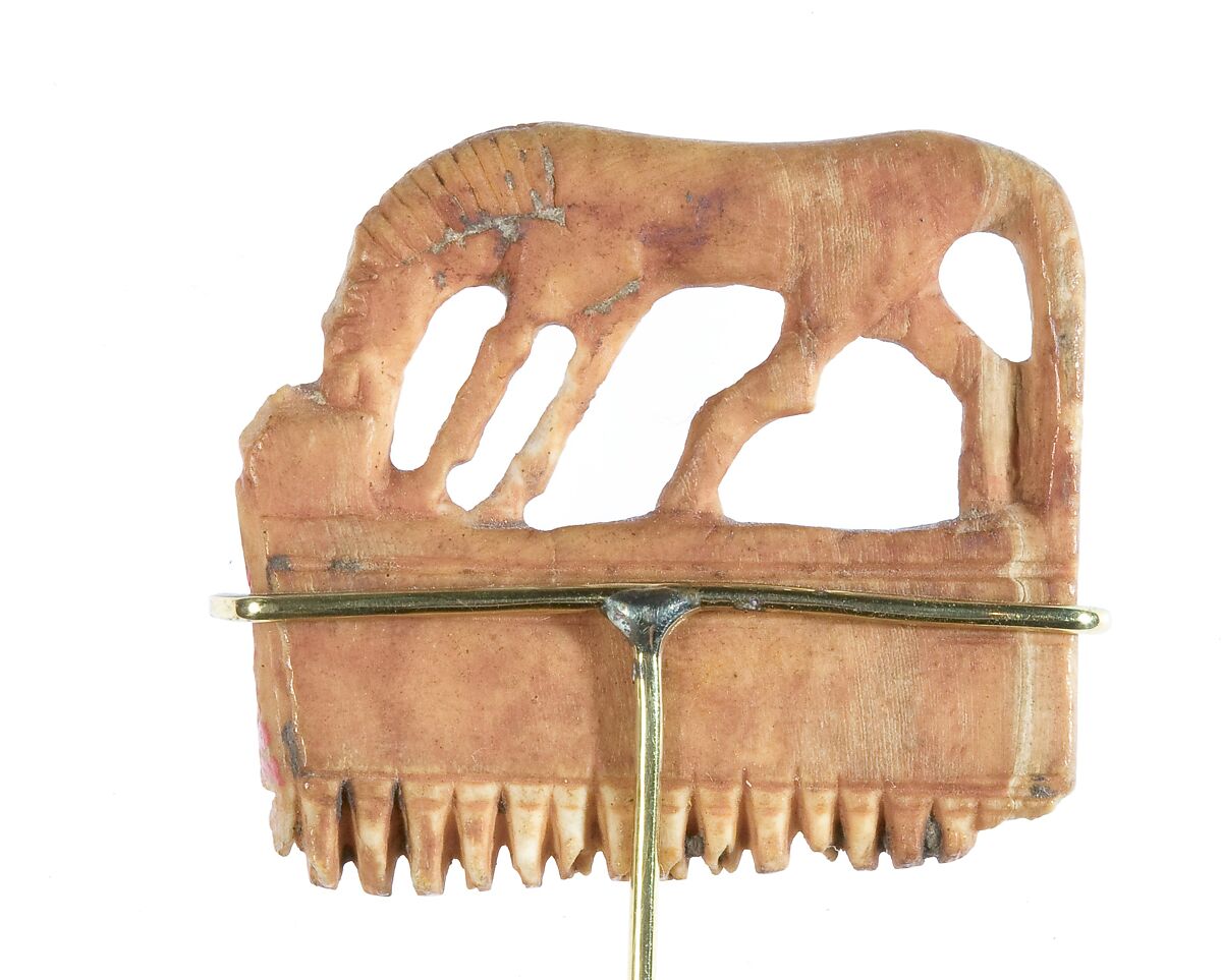 Comb with a horse, Ivory