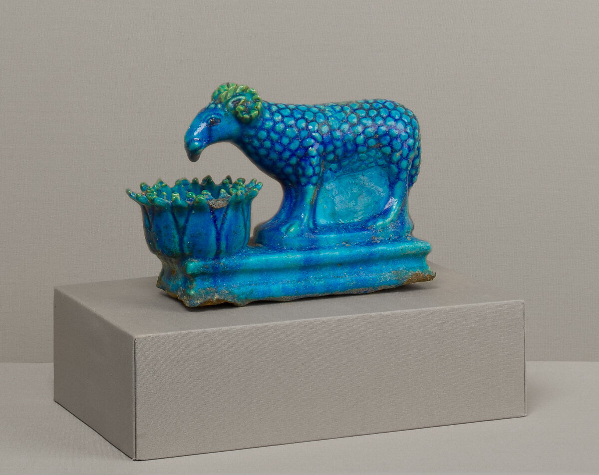 Ram with lotus-shaped manger, Faience 
