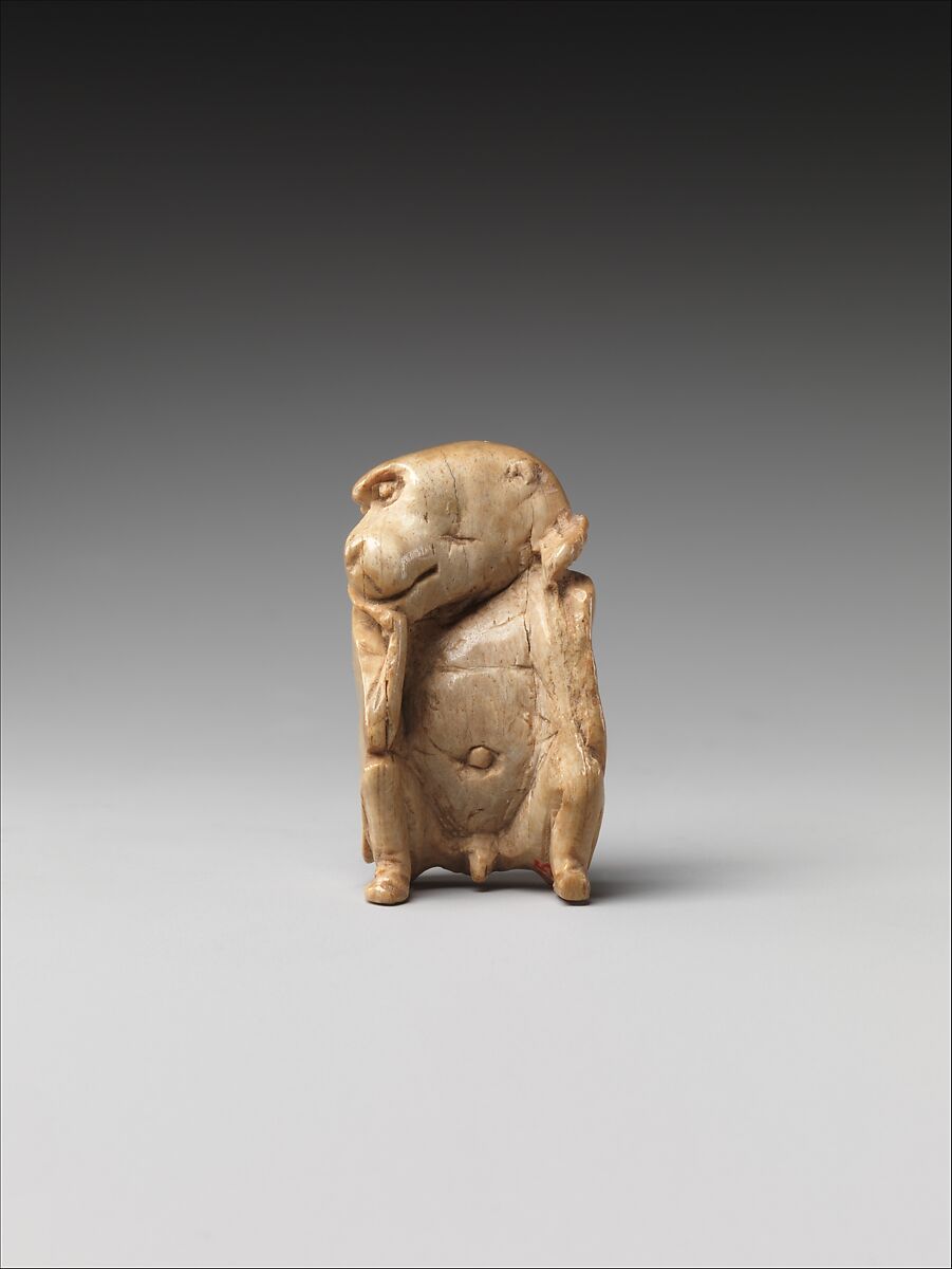 Game piece in the shape of a baboon, Bone