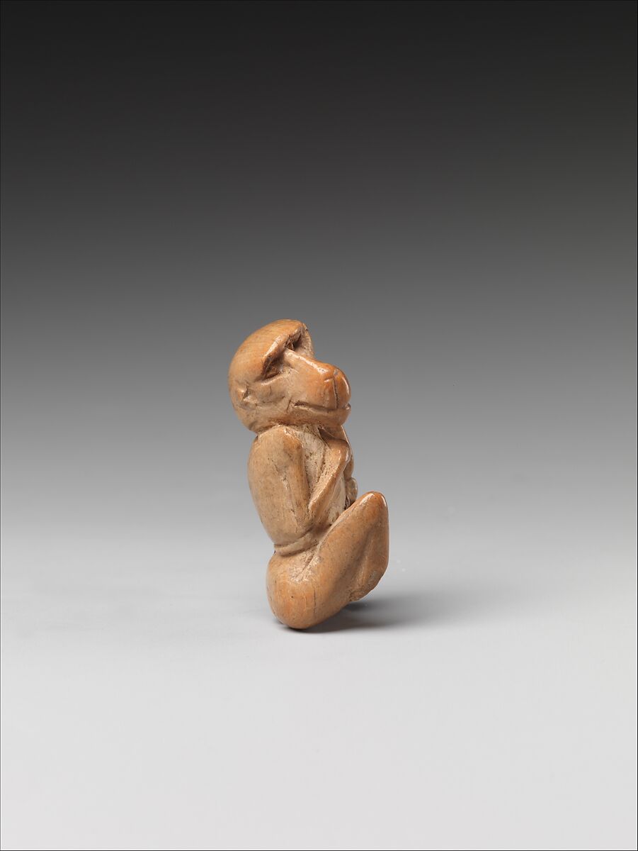 Game piece in the shape of a baboon, Bone 