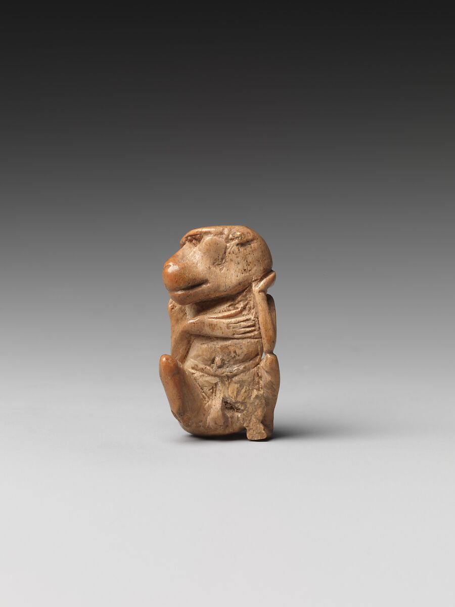 Game piece in the shape of a baboon, Bone