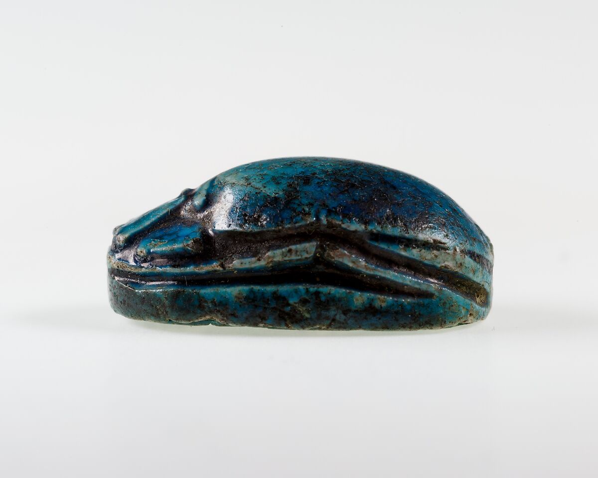Scarab Inscribed with Hieroglyphs in a Scroll Border, Bright blue glazed steatite