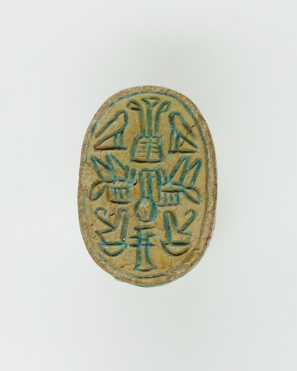 Scarab Inscribed with Hieroglyphs, Brigth blue glazed steatite 