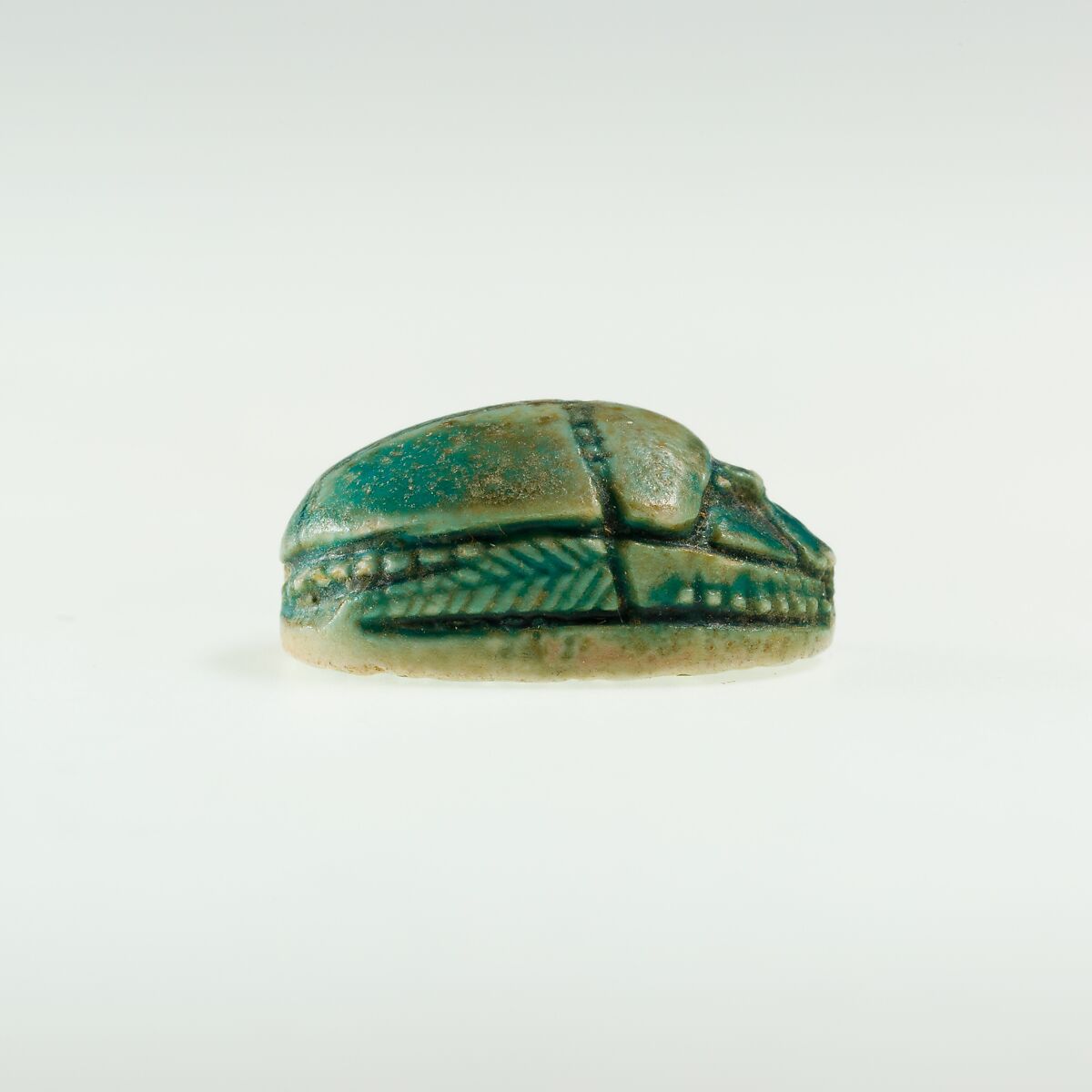 Scarab Incised with Circles and Lotus Flowers, Green glazed steatite